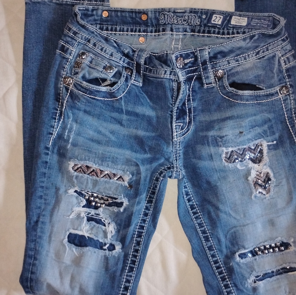 Distressed Blue Jeans